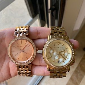 Two Michael kors watches